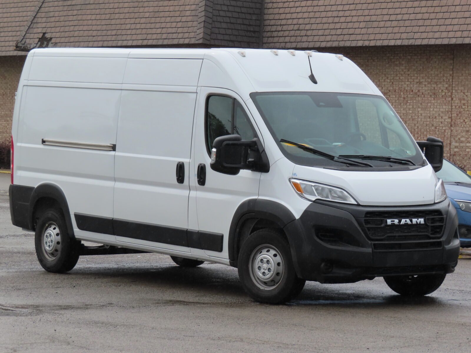 White delivery cargo van — fleet vehicle branding by TOOQ